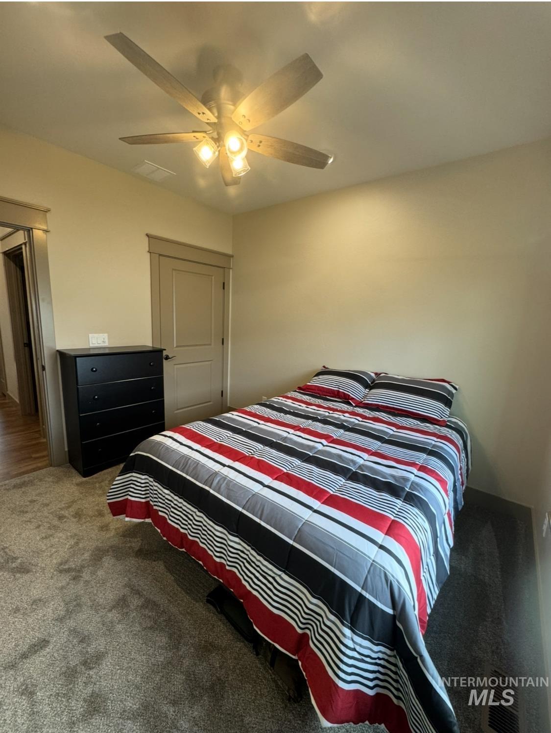 1346 Zephlyn Street Twin Falls, ID 83301 - Photo 27 of 34 Bedroom with carpet and a ceiling fan