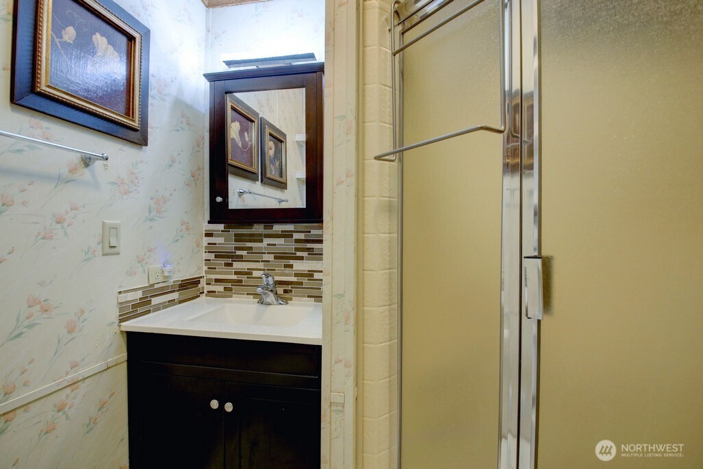 96 Sunset Circle Maple Falls, WA 98266 - Photo 15 of 31 a bathroom with a sink and a mirror
