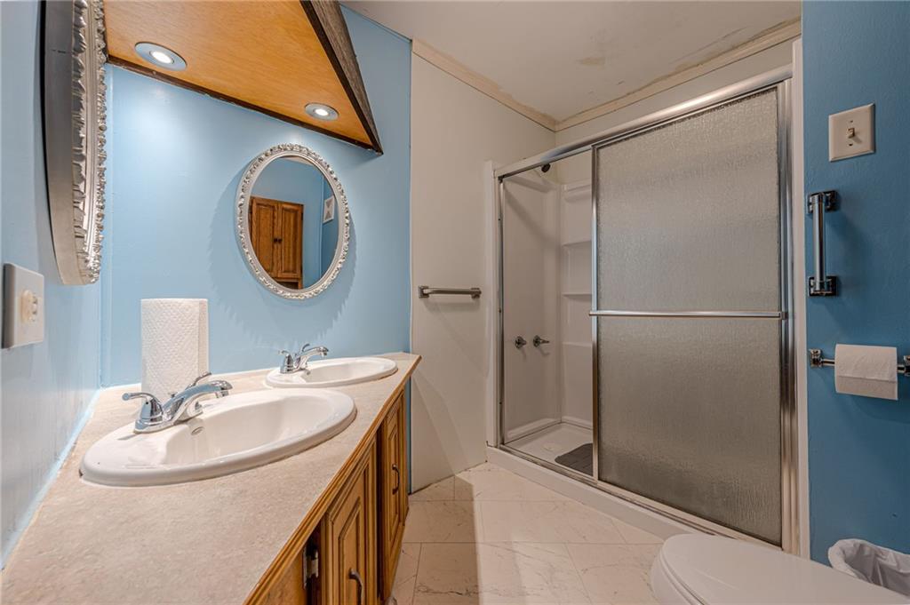 90 Valley Trail Southeast Acworth, GA 30101 - Photo 15 of 28 a bathroom with a sink and a mirror