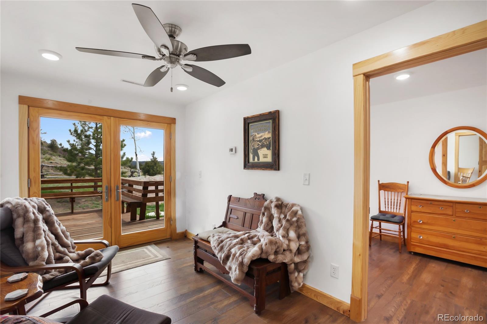 437 Langnis Road Guffey, CO 80820 - Photo 11 of 33 a living room with furniture and a window