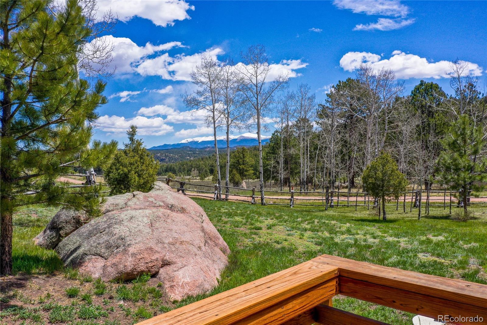 437 Langnis Road Guffey, CO 80820 - Photo 30 of 33 a view of a golf course with a fountain