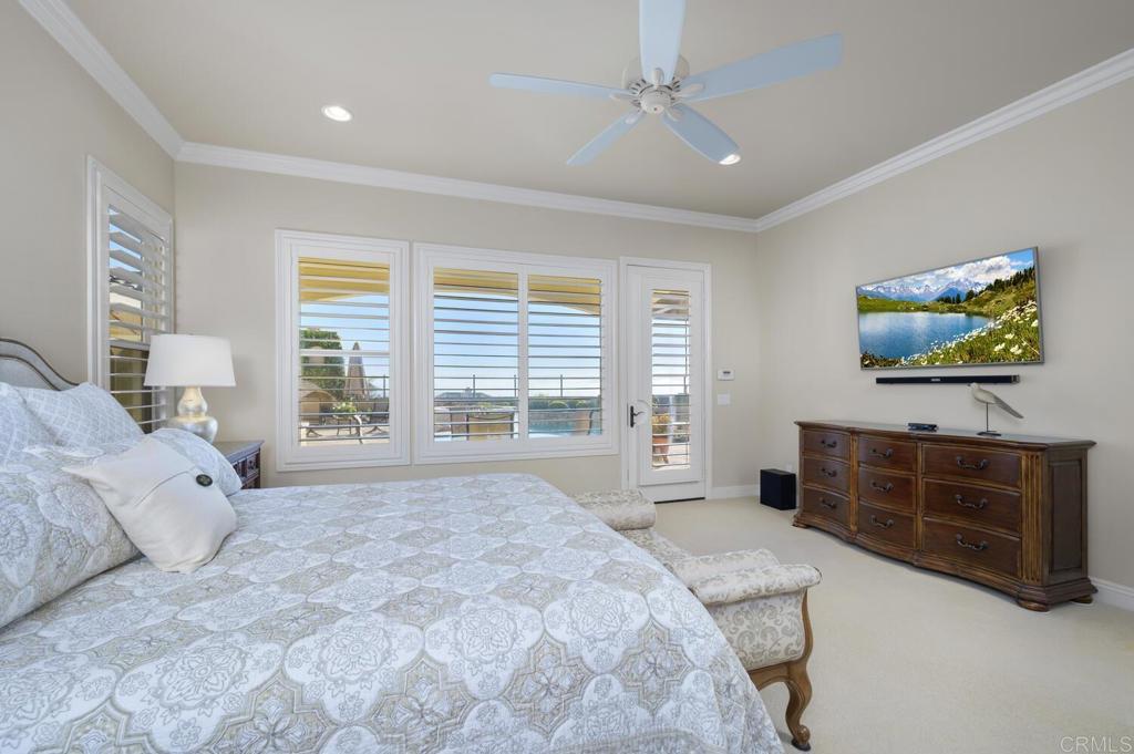 7089 Heron Circle Carlsbad, CA 92011 - Photo 23 of 58 a spacious bedroom with a bed and a dresser