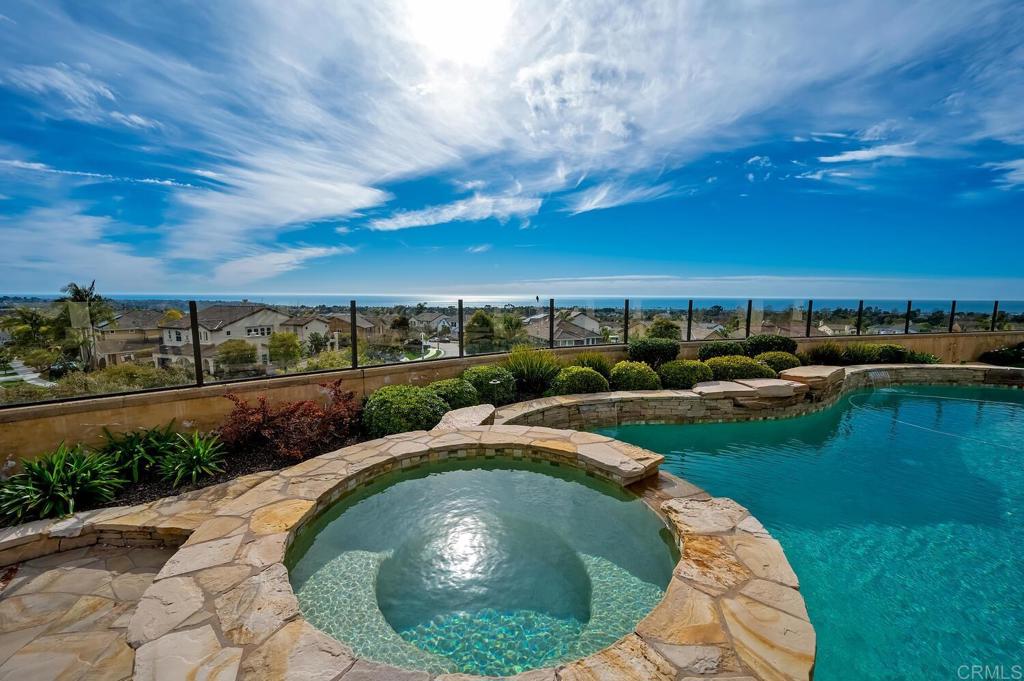 7089 Heron Circle Carlsbad, CA 92011 - Photo 47 of 58 an outdoor view with swimming pool and outdoor seating