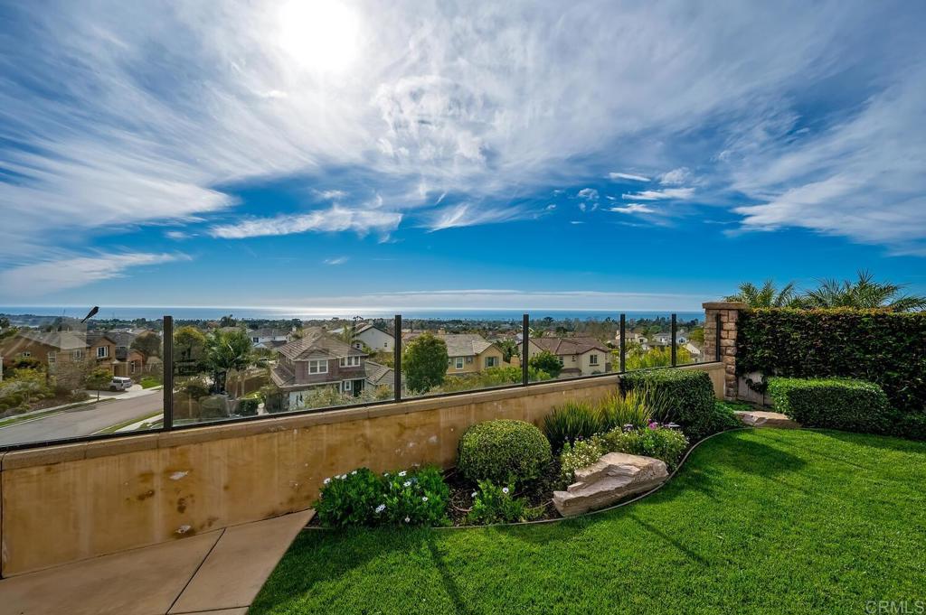 7089 Heron Circle Carlsbad, CA 92011 - Photo 50 of 58 a view of a garden with a terrace