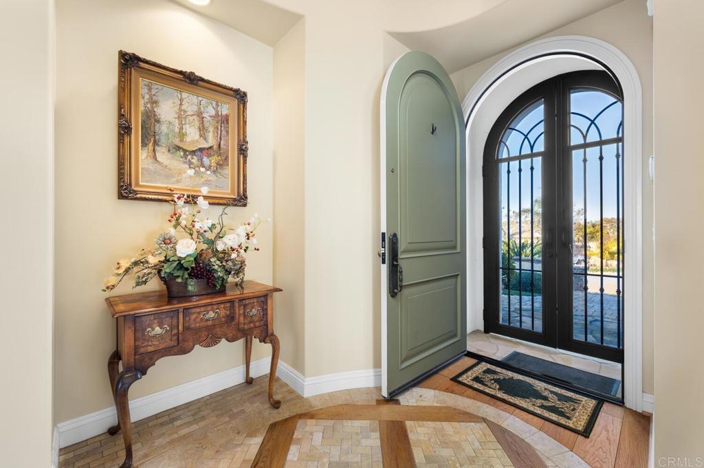 7089 Heron Circle Carlsbad, CA 92011 - Photo 8 of 58 a front view of a house with garden