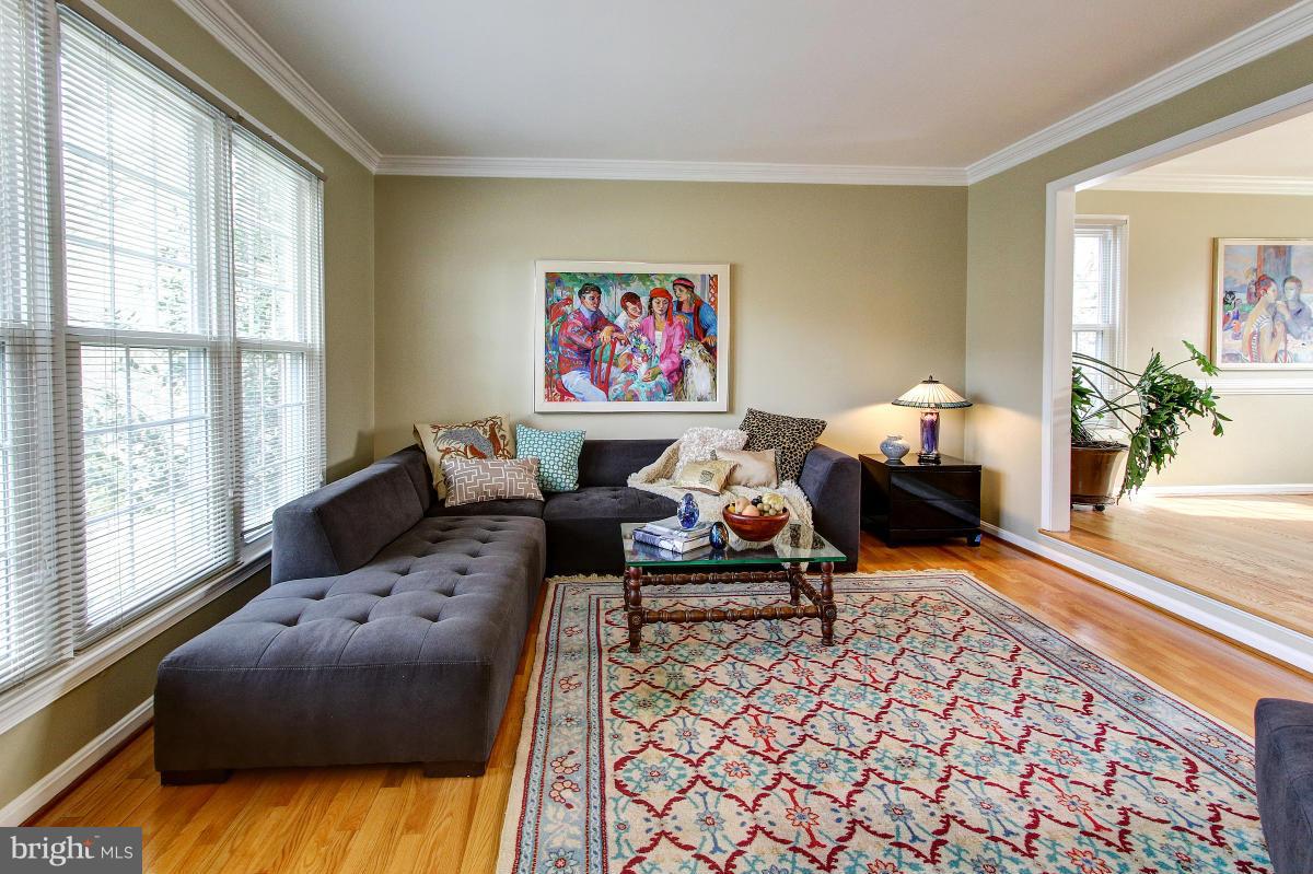 1418 Atwood Road Silver Spring, MD 20906 - Photo 3 of 29 Living Room w/Wood Flooring & Crown Molding