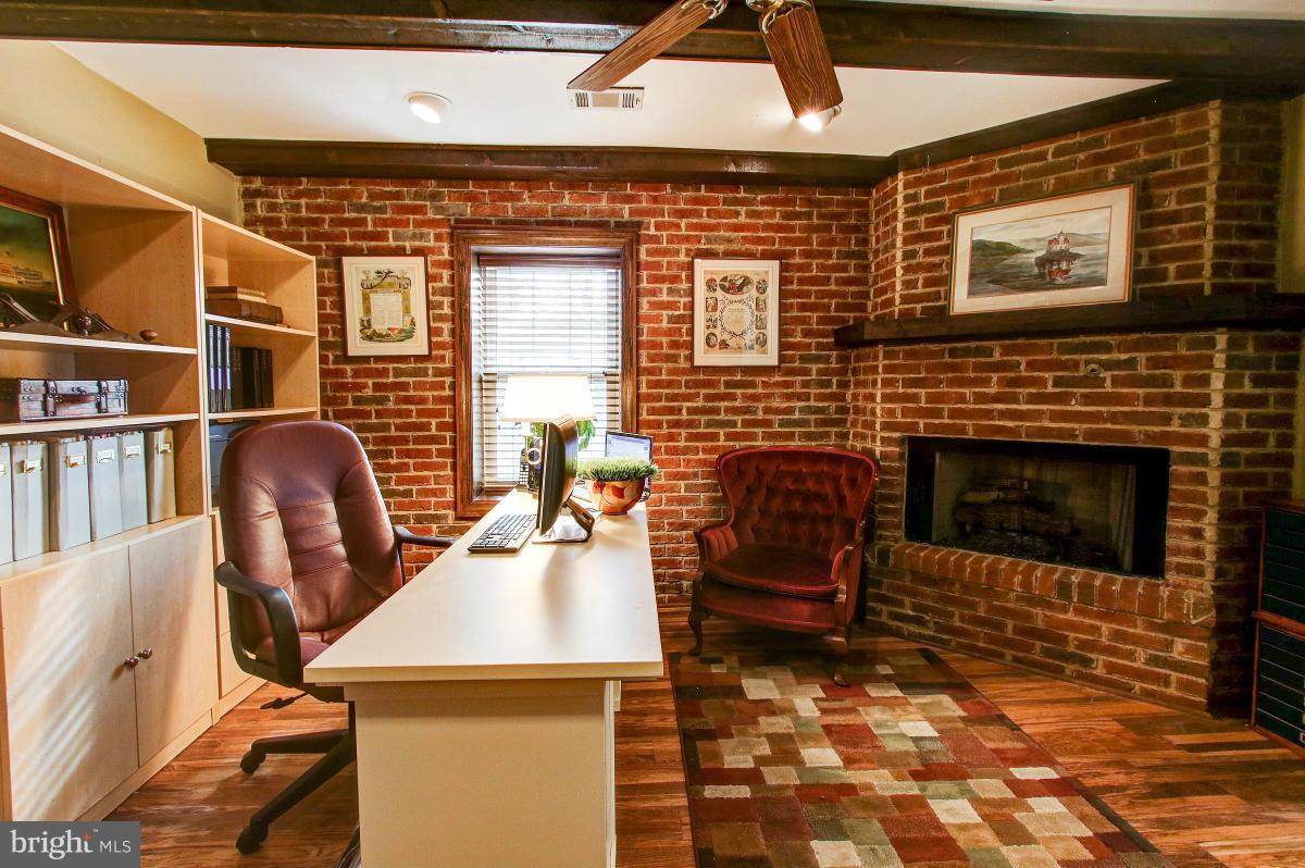 1418 Atwood Road Silver Spring, MD 20906 - Photo 22 of 29 Lower Level Den/Study or Bedroom #6 w/Fireplace