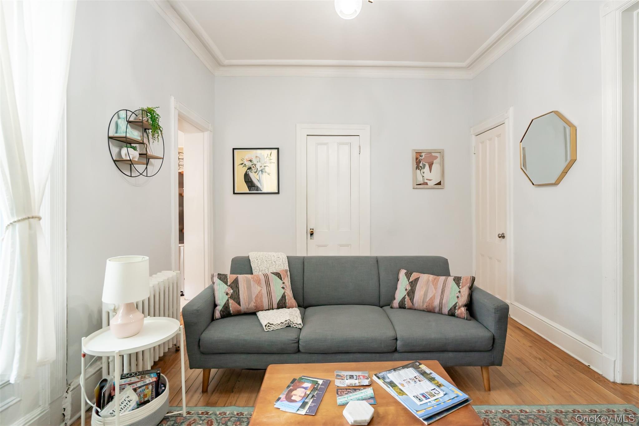 175 Liberty Street Newburgh, NY 12550 - Photo 12 of 50 a living room with furniture and a couch