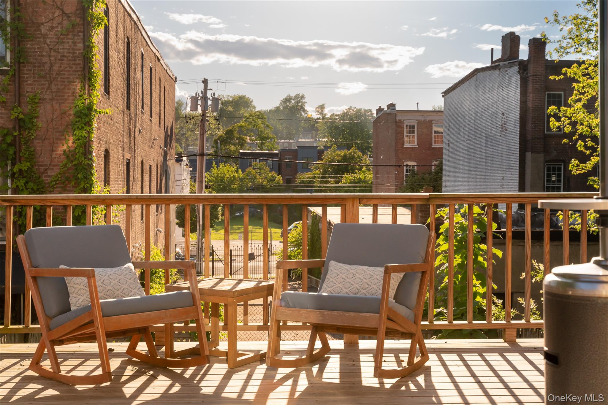 175 Liberty Street Newburgh, NY 12550 - Photo 21 of 50 a view of a chairs and table on the roof deck