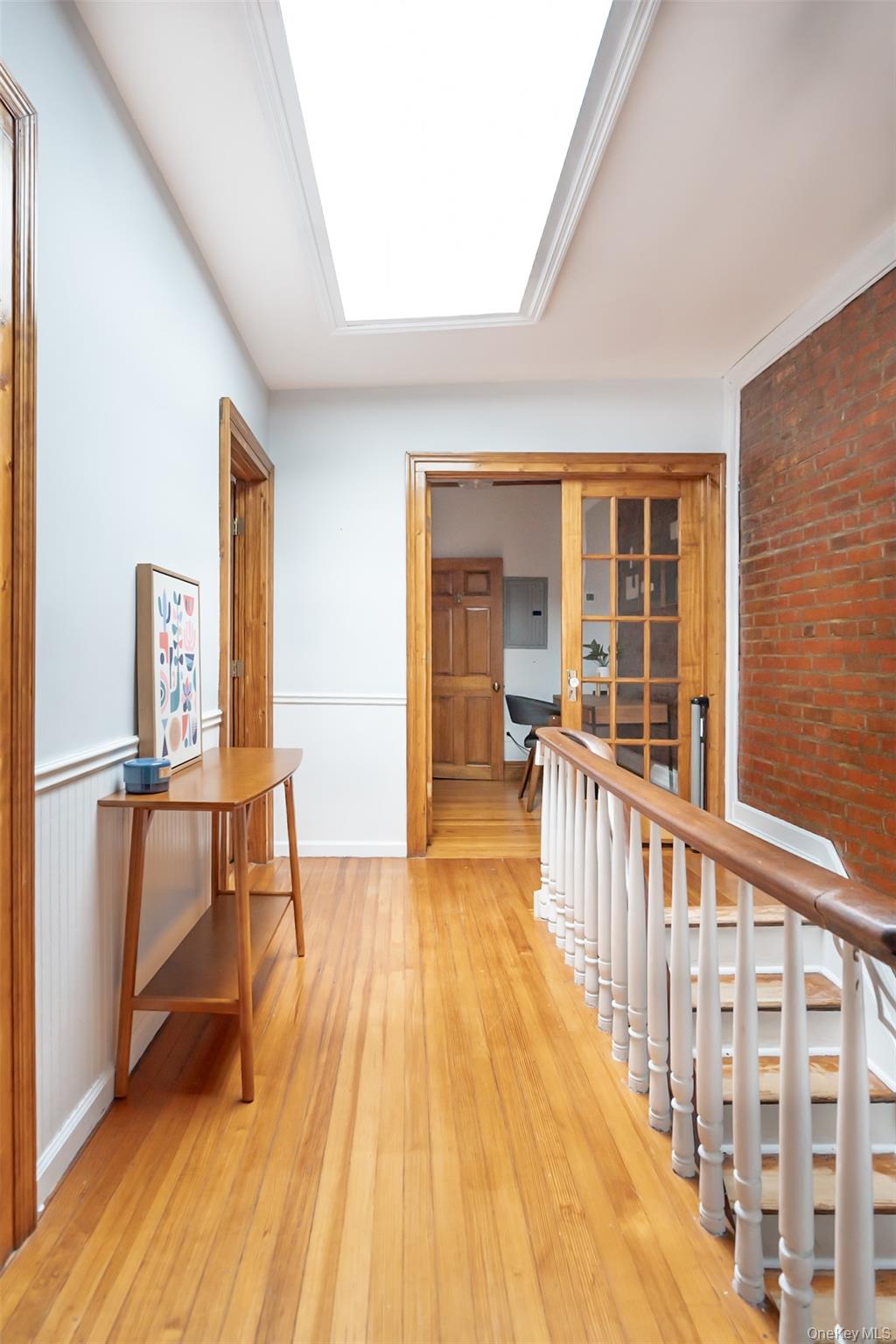175 Liberty Street Newburgh, NY 12550 - Photo 23 of 50 a view of a bedroom with wooden floor and furniture