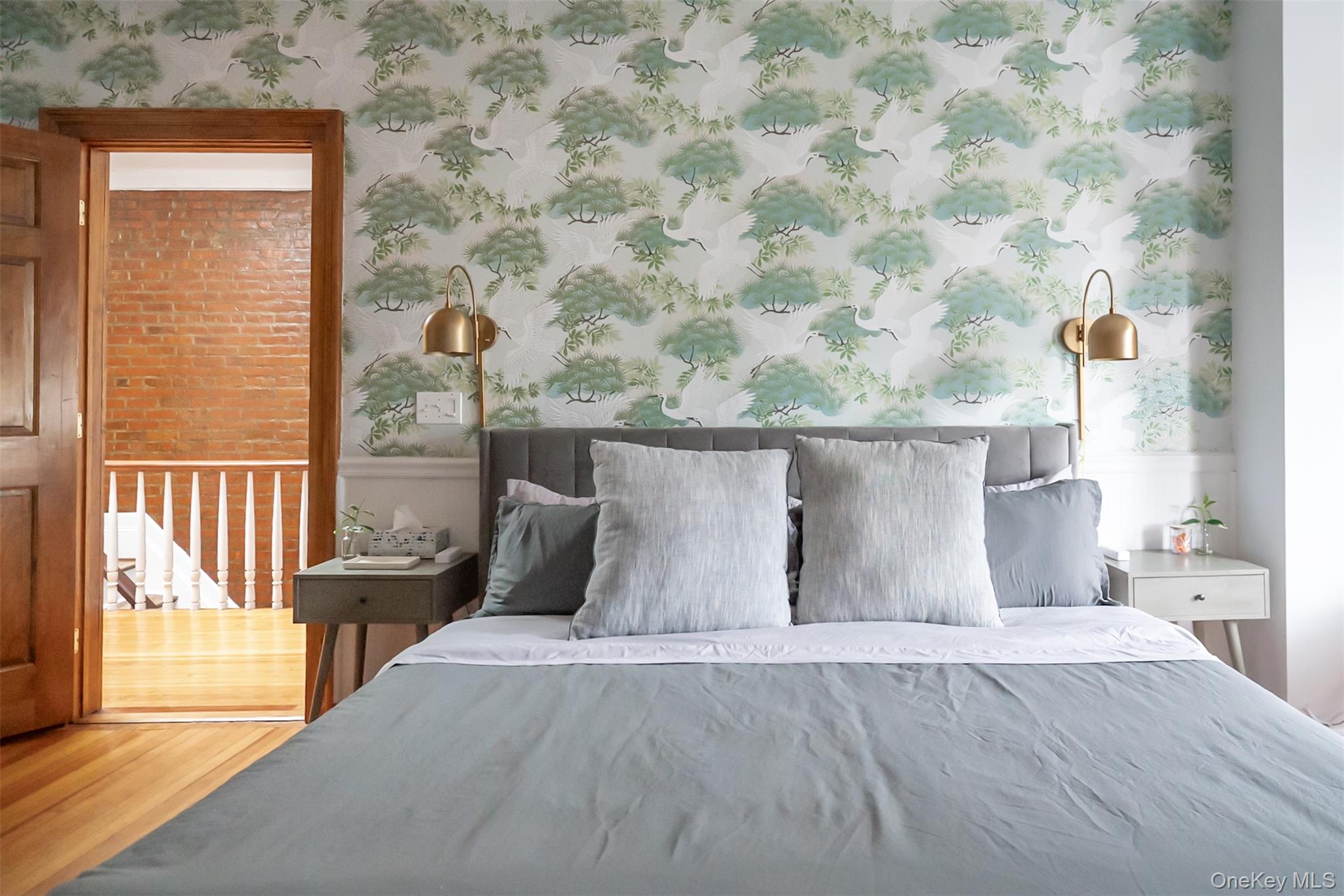 175 Liberty Street Newburgh, NY 12550 - Photo 25 of 50 a bed sitting in a bedroom next to a window