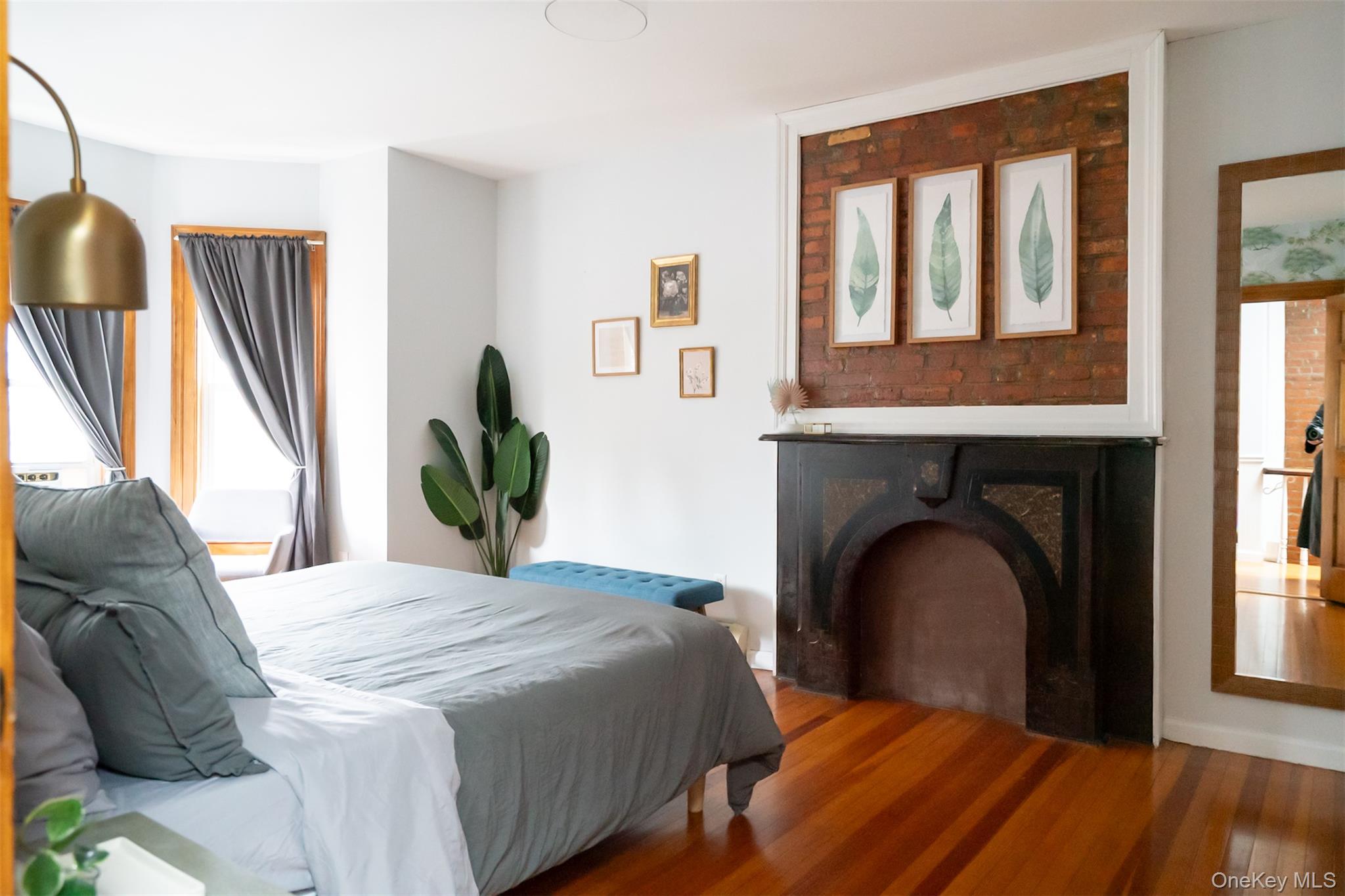 175 Liberty Street Newburgh, NY 12550 - Photo 27 of 50 a bedroom with a bed and a large window