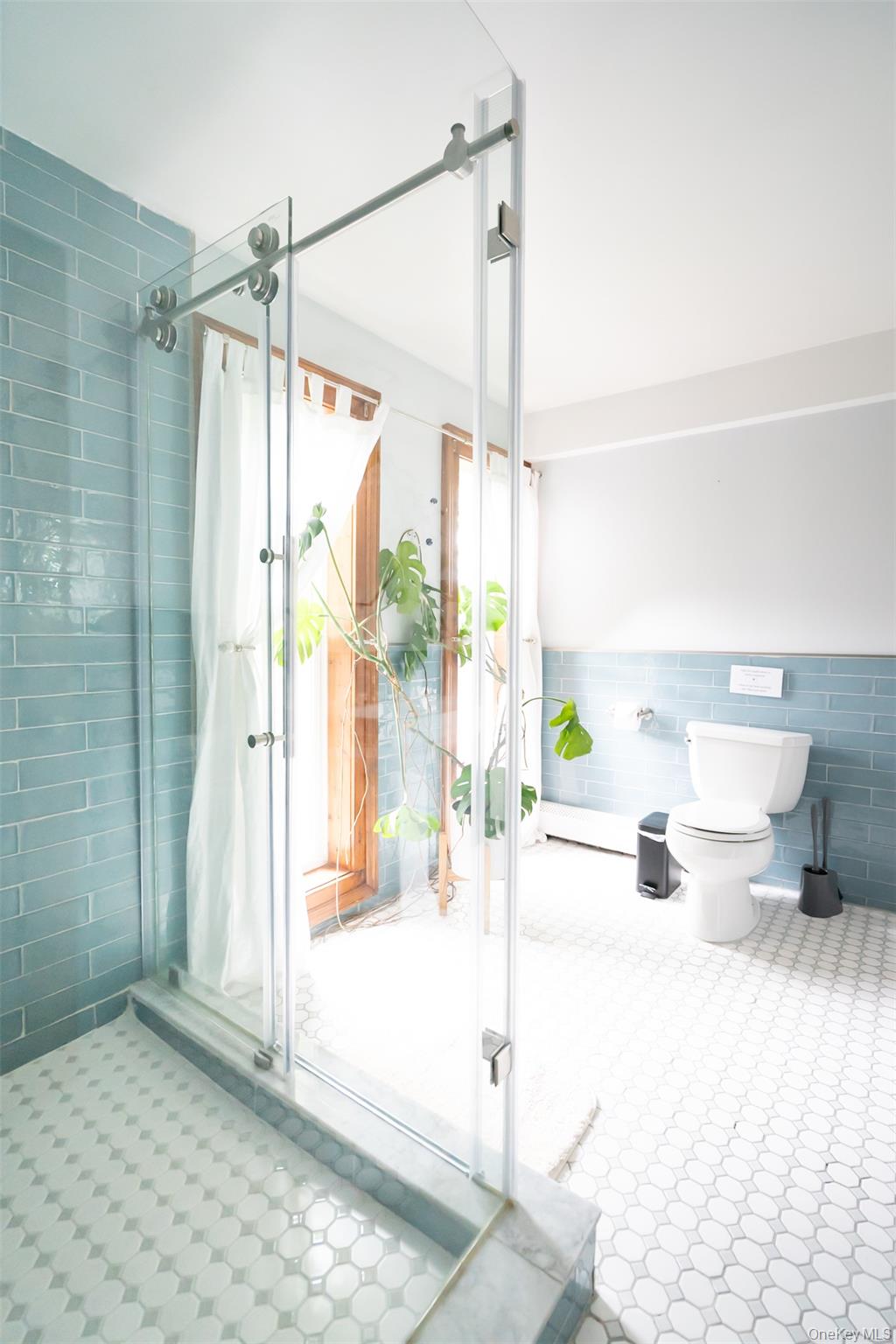 175 Liberty Street Newburgh, NY 12550 - Photo 29 of 50 a bathroom with a shower and a toilet