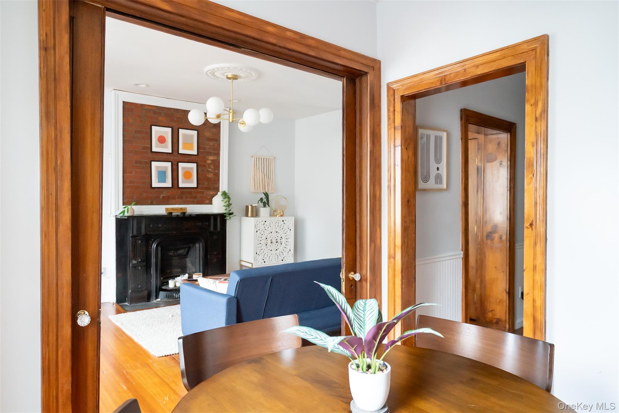 175 Liberty Street Newburgh, NY 12550 - Photo 32 of 50 a living room with furniture and a fireplace