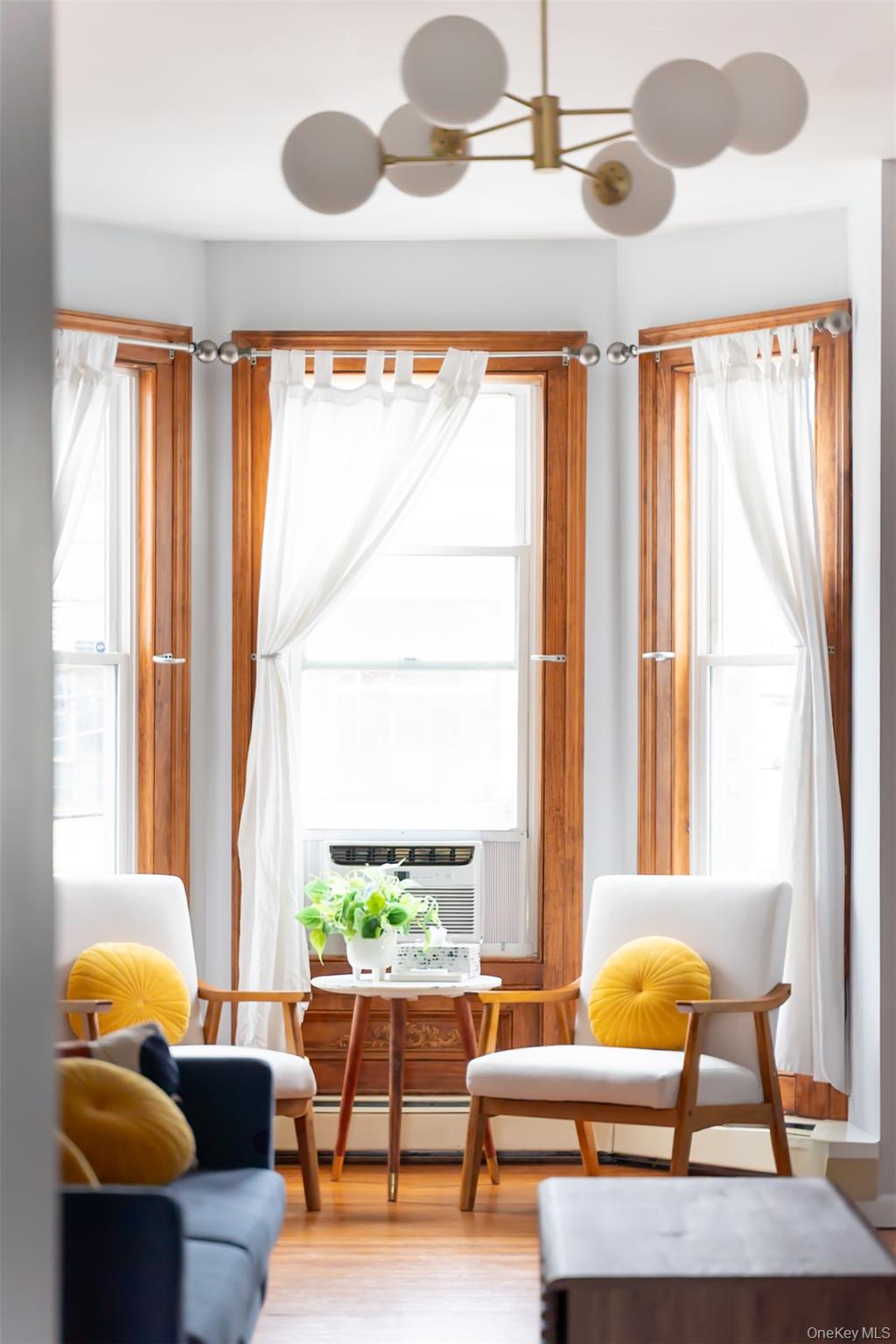175 Liberty Street Newburgh, NY 12550 - Photo 34 of 50 a living room with furniture and a large window