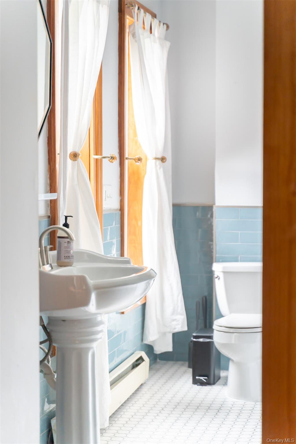 175 Liberty Street Newburgh, NY 12550 - Photo 40 of 50 a view of front door with furniture and a window