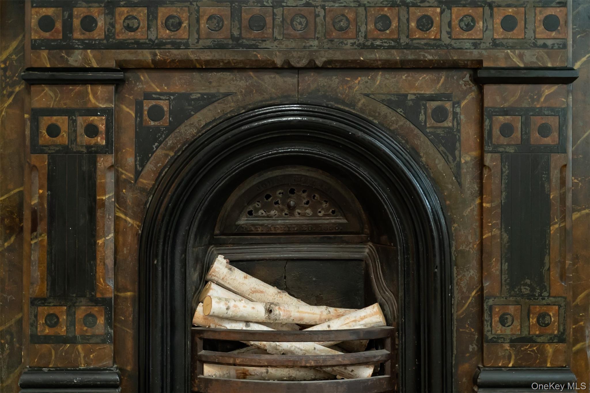 175 Liberty Street Newburgh, NY 12550 - Photo 7 of 50 a close view of a fireplace