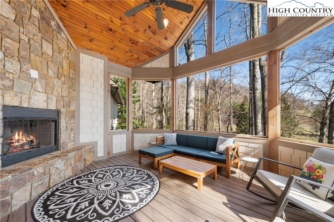 46 North Ridge Lane Newland, NC 28657 - Photo 21 of 46 a living room with furniture and a fireplace