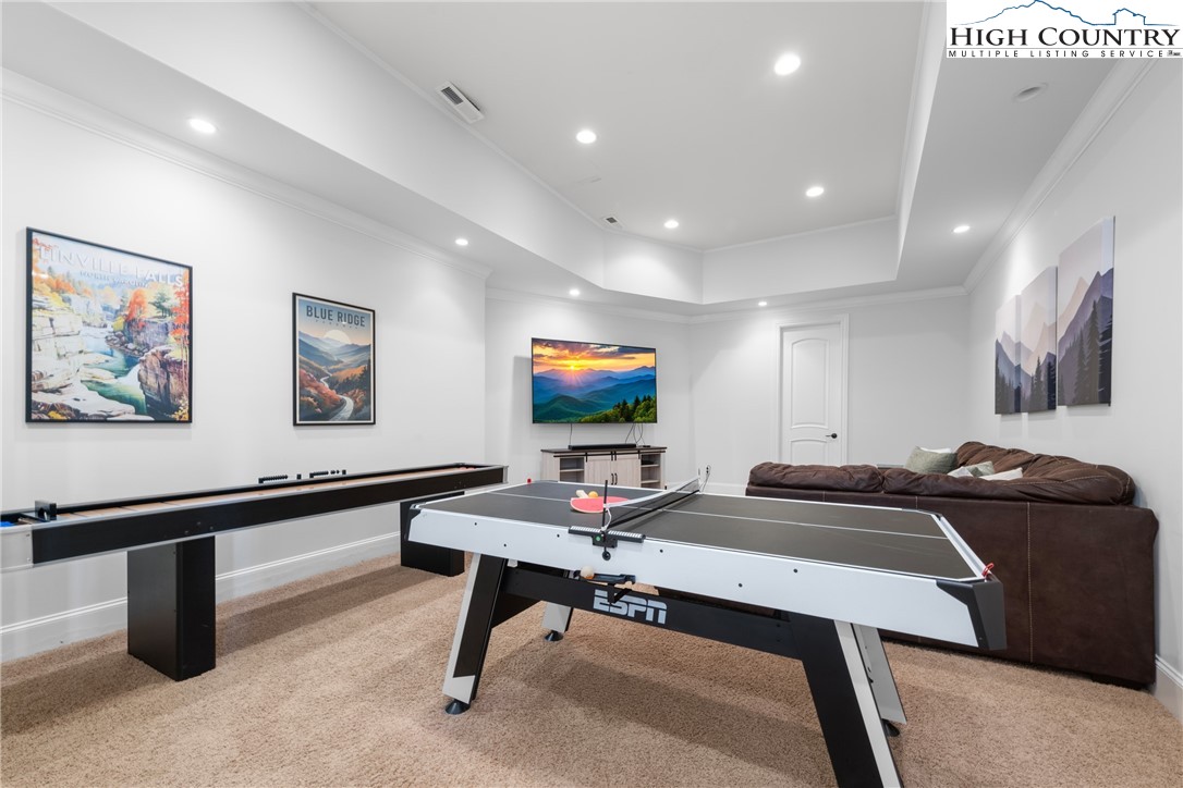 46 North Ridge Lane Newland, NC 28657 - Photo 34 of 46 a living room with furniture and a flat screen tv