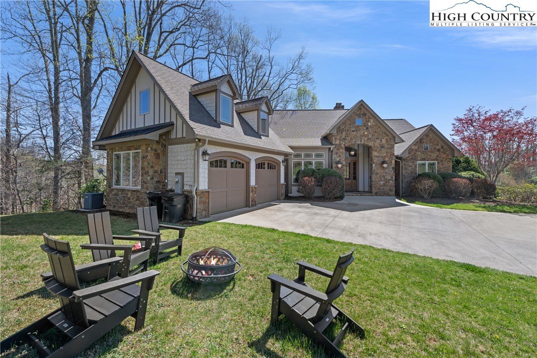 46 North Ridge Lane Newland, NC 28657 - Photo 36 of 46 a front view of a house with garden