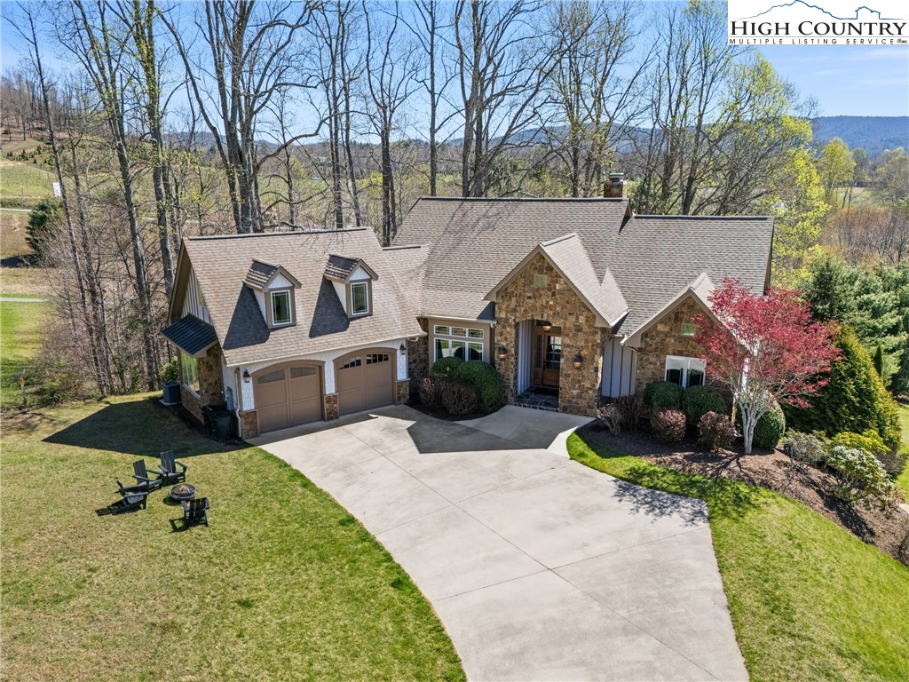 46 North Ridge Lane Newland, NC 28657 - Photo 37 of 46 a view of house with yard and outdoor seating