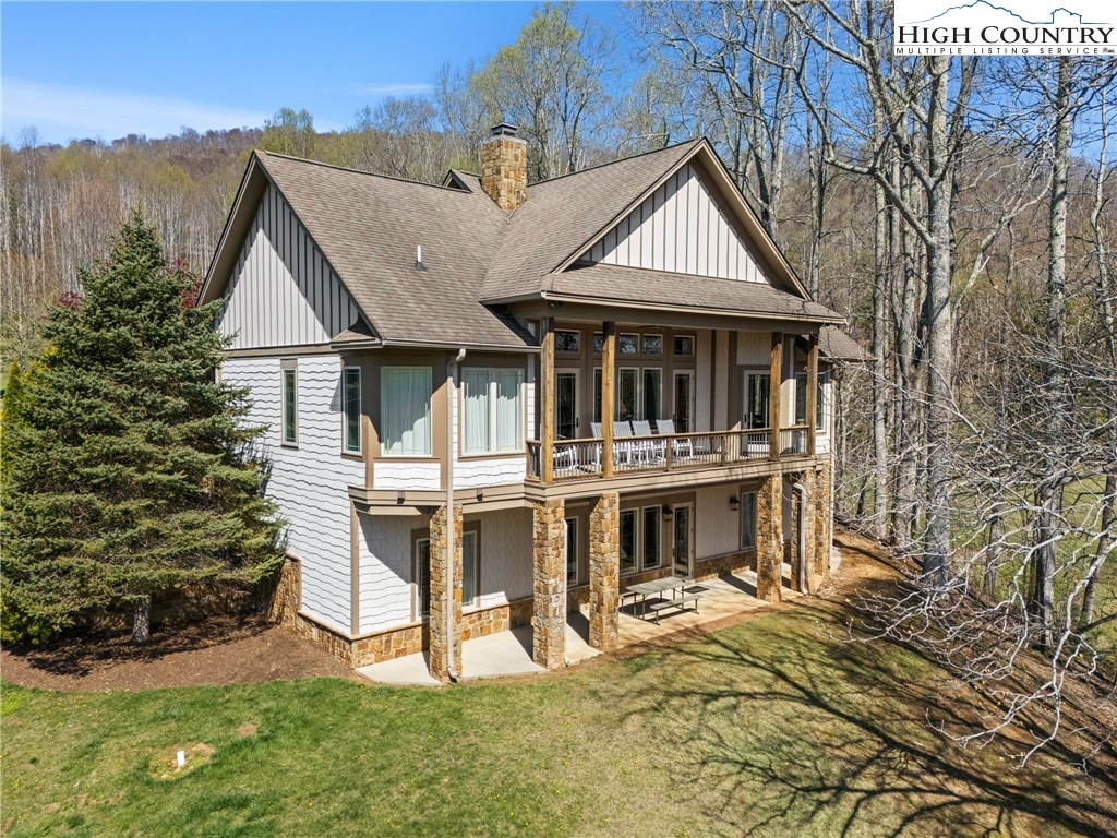 46 North Ridge Lane Newland, NC 28657 - Photo 39 of 46 a front view of a house with garden