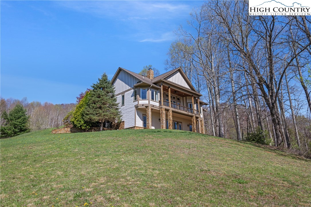 46 North Ridge Lane Newland, NC 28657 - Photo 40 of 46 a view of a house with a yard