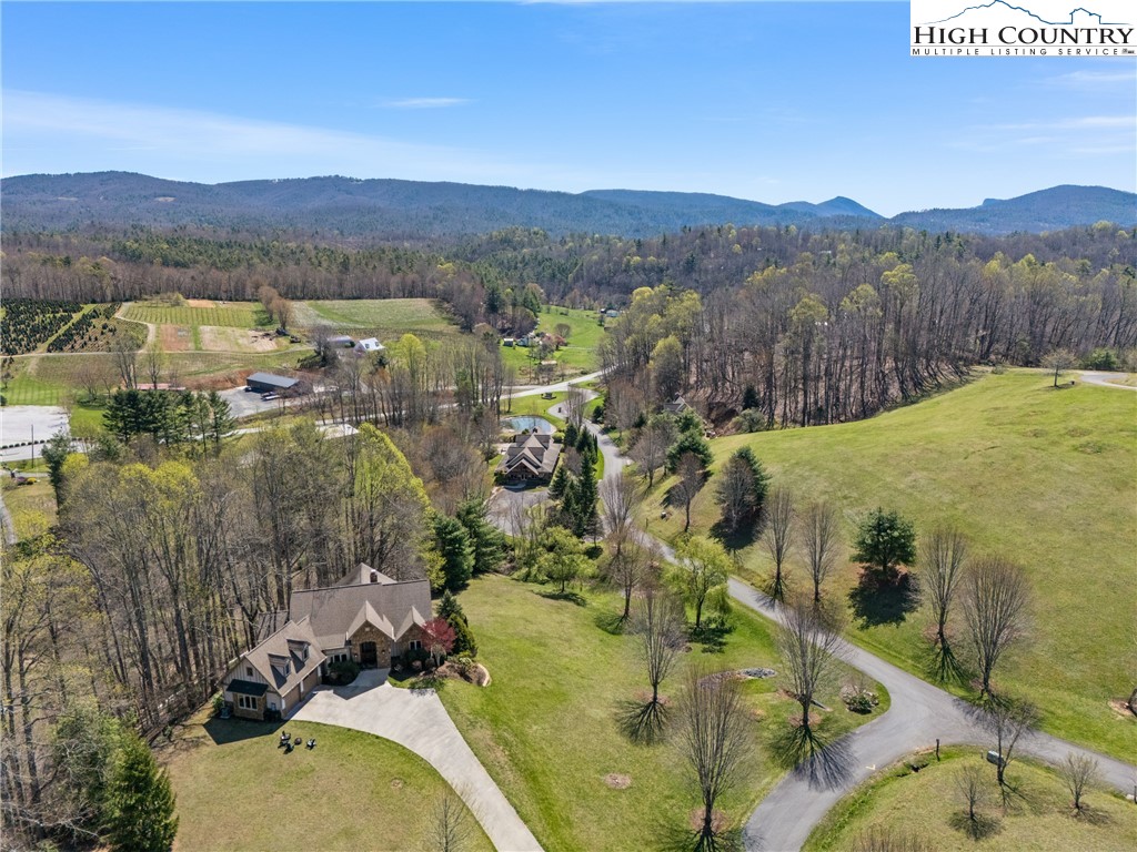 46 North Ridge Lane Newland, NC 28657 - Photo 43 of 46 a view of a lake with a mountain in the background