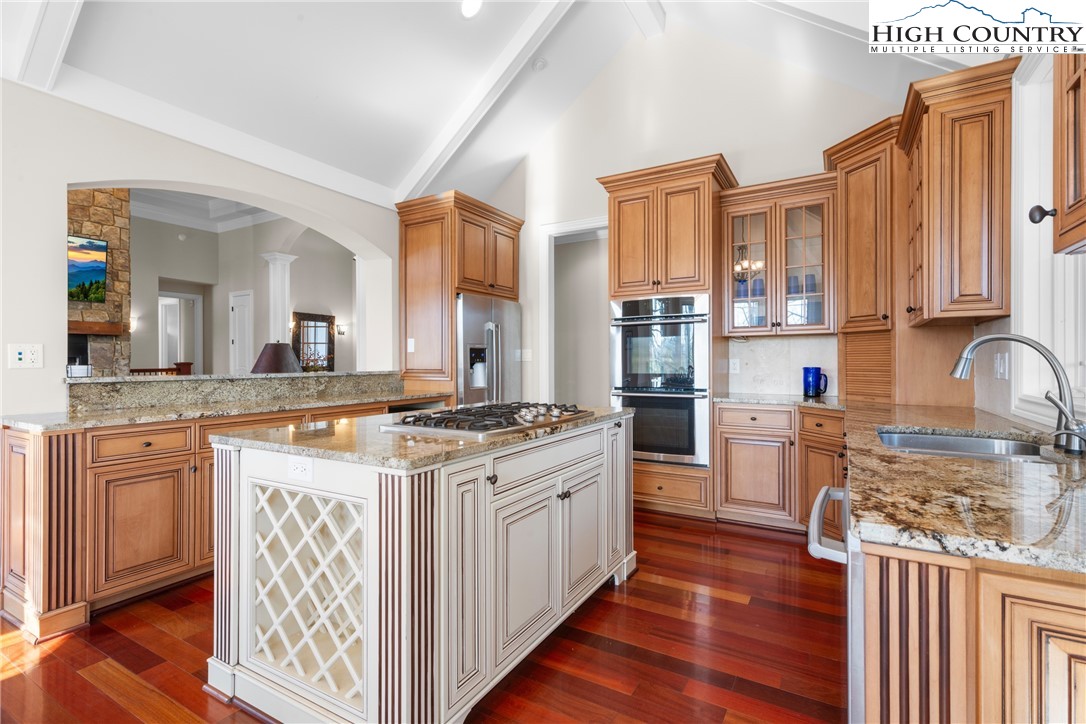 46 North Ridge Lane Newland, NC 28657 - Photo 10 of 46 a kitchen with stainless steel appliances granite countertop a stove and cabinets