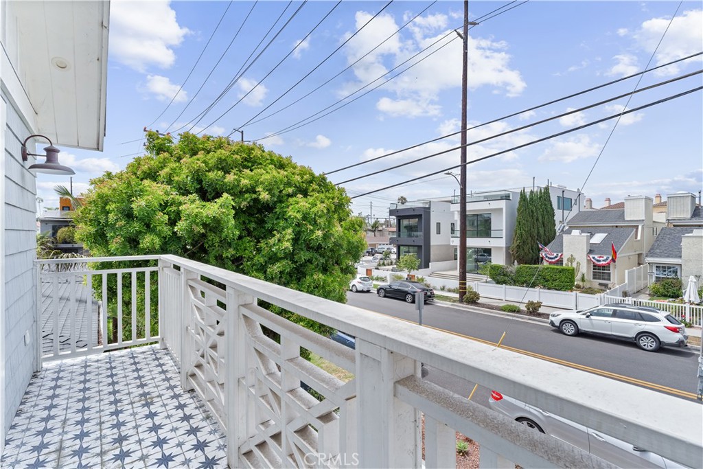 208 Indianapolis Avenue Huntington Beach, CA 92648 - Photo 25 of 66 a view of a building from a balcony