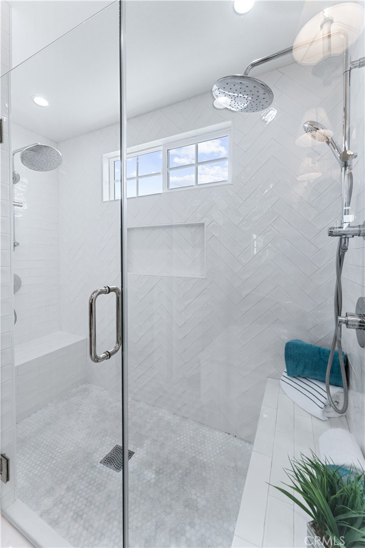 208 Indianapolis Avenue Huntington Beach, CA 92648 - Photo 27 of 66 a bathroom with a shower