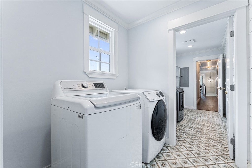 208 Indianapolis Avenue Huntington Beach, CA 92648 - Photo 33 of 66 a utility room with dryer and washer