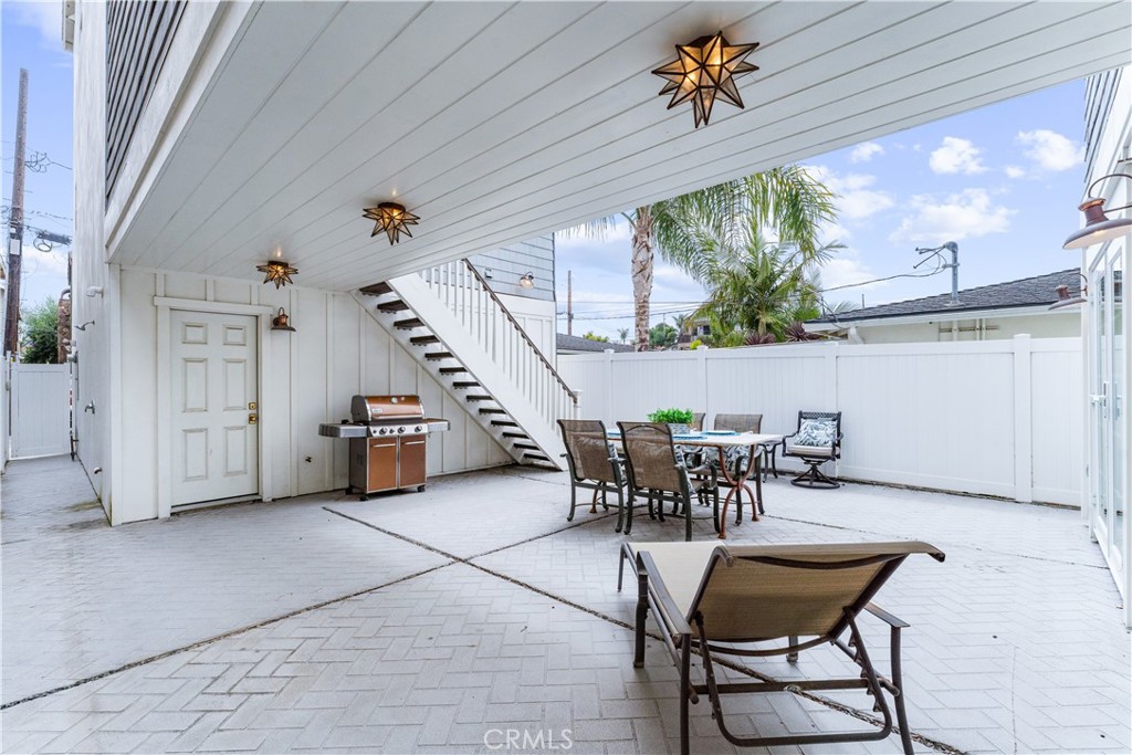 208 Indianapolis Avenue Huntington Beach, CA 92648 - Photo 47 of 66 a view of a dining room with furniture window and outside view