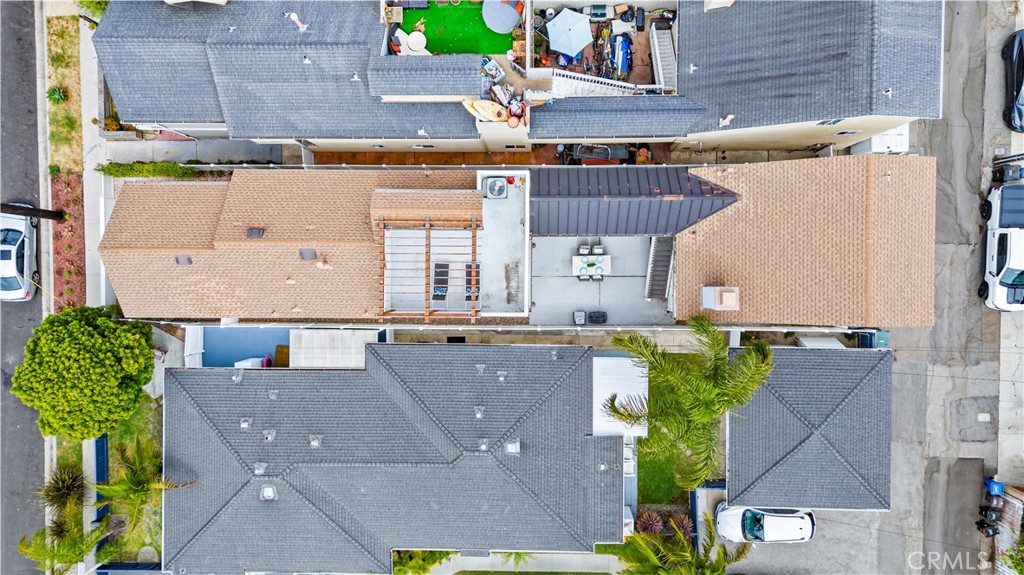 208 Indianapolis Avenue Huntington Beach, CA 92648 - Photo 54 of 66 a view of a house with a patio