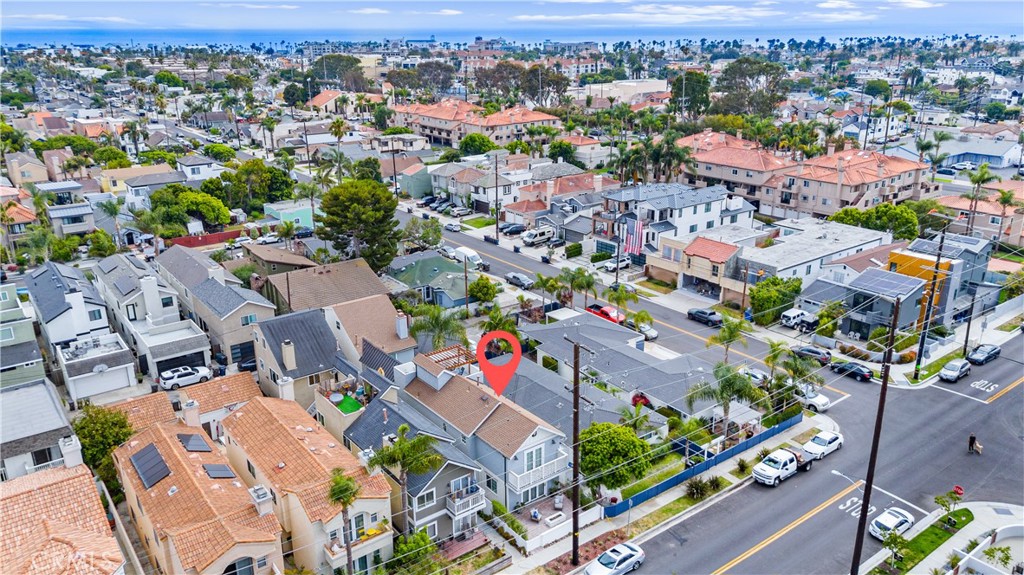 208 Indianapolis Avenue Huntington Beach, CA 92648 - Photo 55 of 66 an aerial view of a city with lots of residential buildings