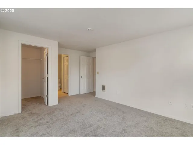 a bathroom with a sink vanity granite and a mirror