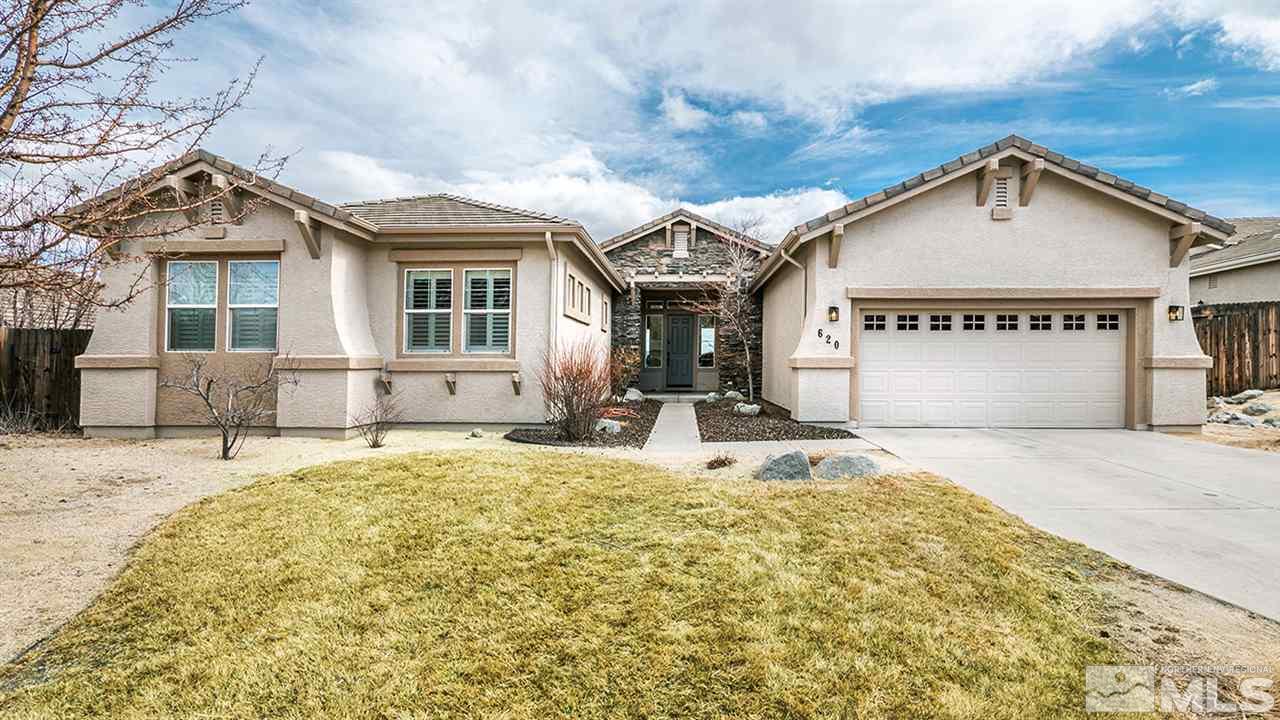 620 Rabbit Ridge Court Reno, NV 89511 - Photo 1 of 34 a view of white house with a large windows