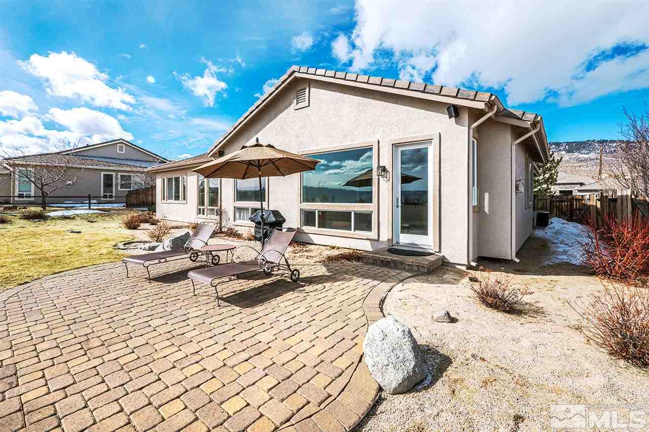 620 Rabbit Ridge Court Reno, NV 89511 - Photo 31 of 34 a view of a house with swimming pool and sitting area