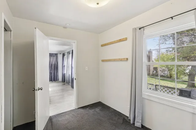 a view of livingroom with furniture and wooden floor