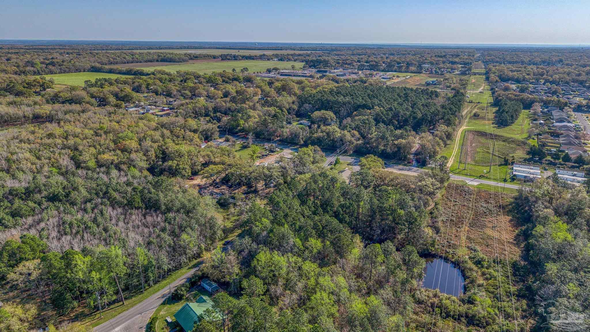 0 Guernsey Road Pace, FL 32571 - Photo 11 of 23 an aerial view of multiple house