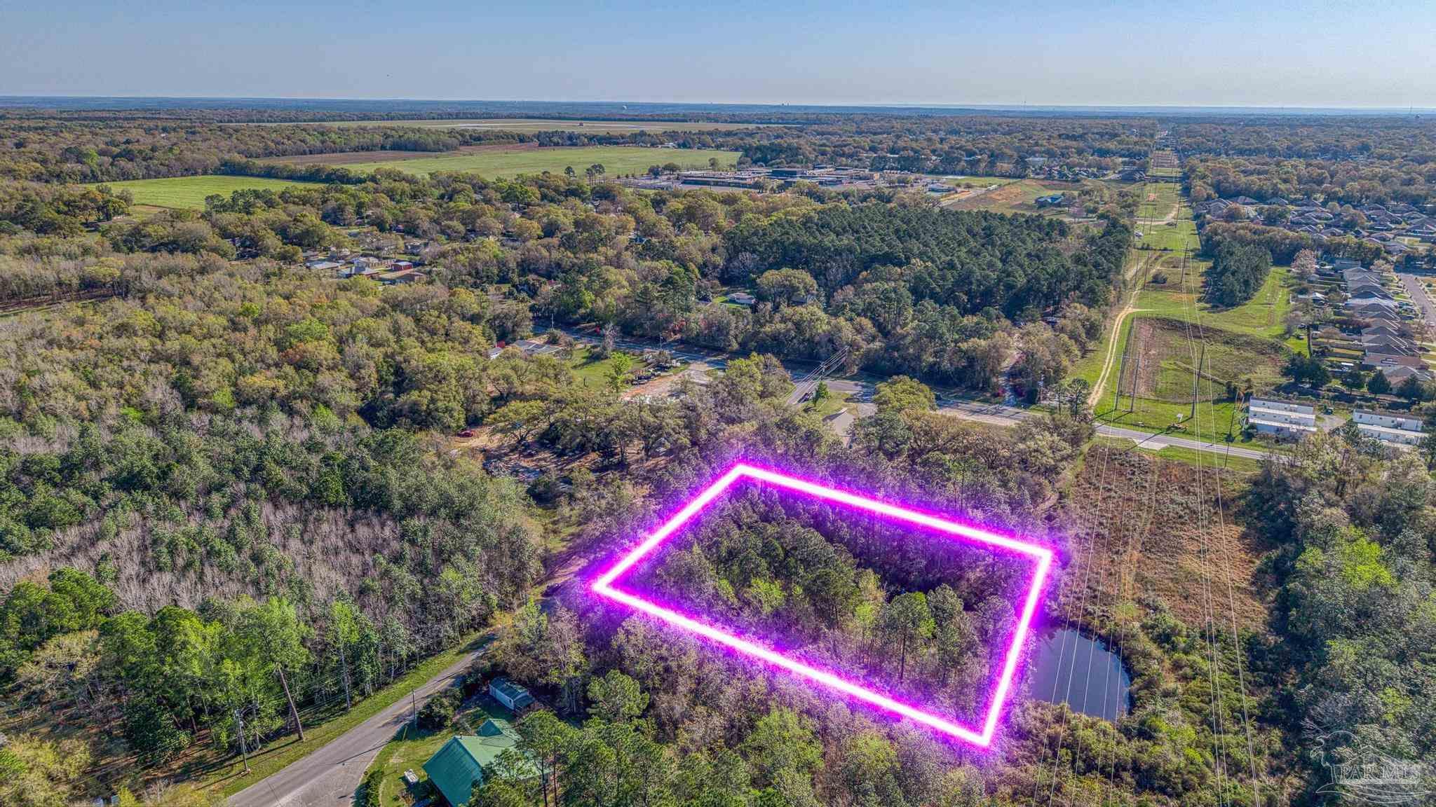 0 Guernsey Road Pace, FL 32571 - Photo 2 of 23 an aerial view of a houses with an outdoor space