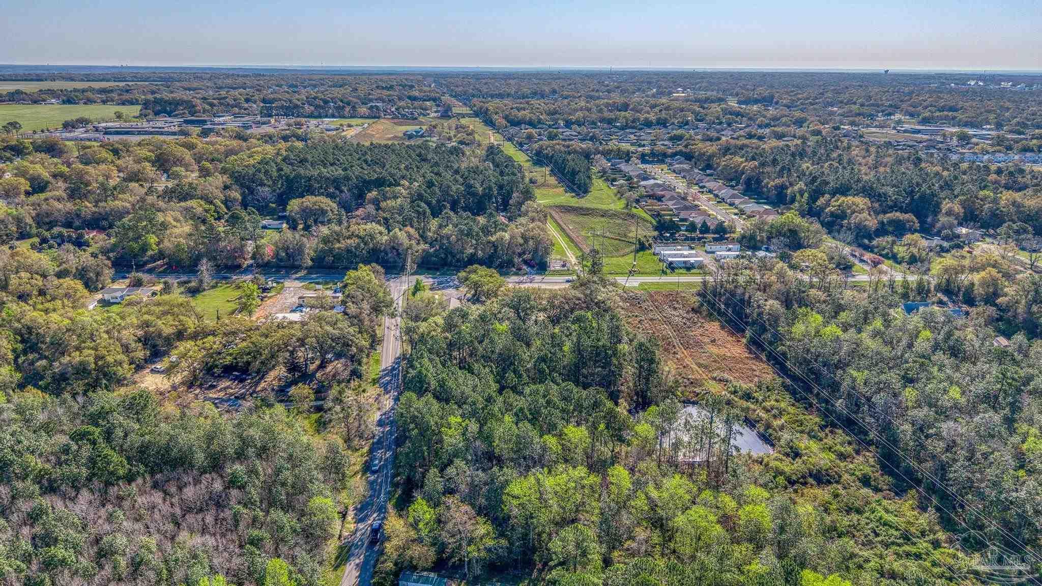 0 Guernsey Road Pace, FL 32571 - Photo 10 of 23 a view of a city