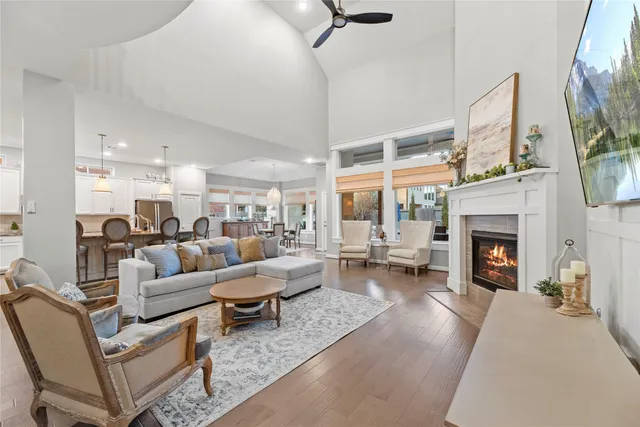 a living room with furniture fireplace and a flat screen tv