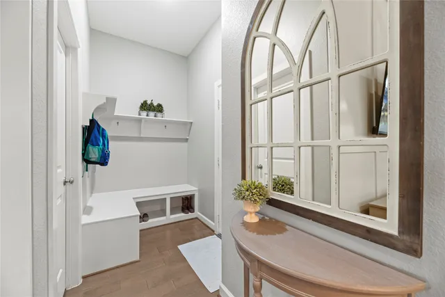 a room with a table and chairs