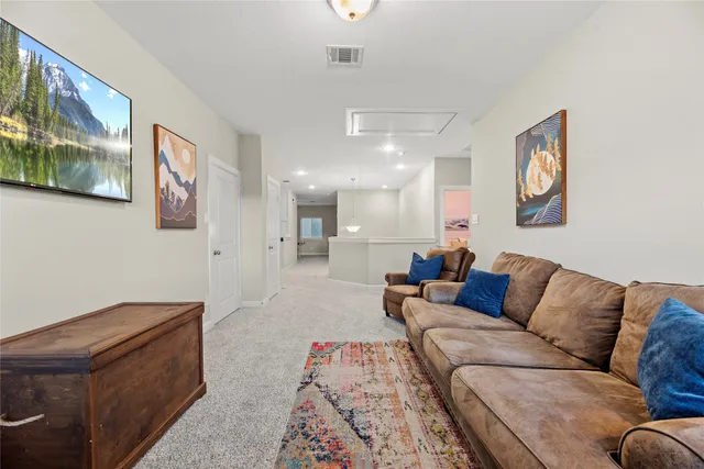 a living room with furniture and a couch