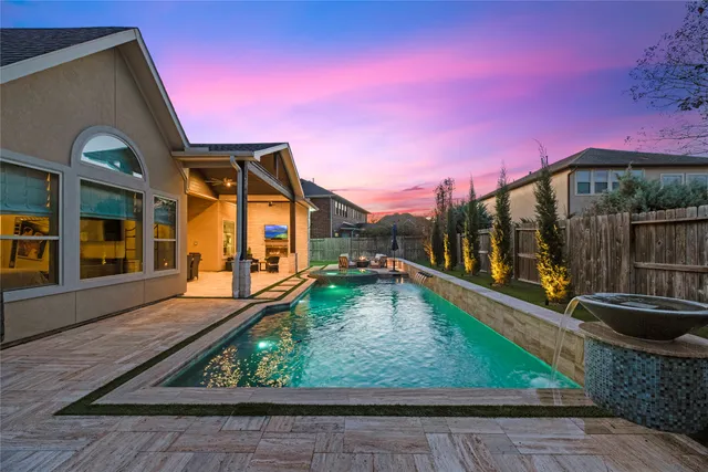 a view of a house with a swimming pool