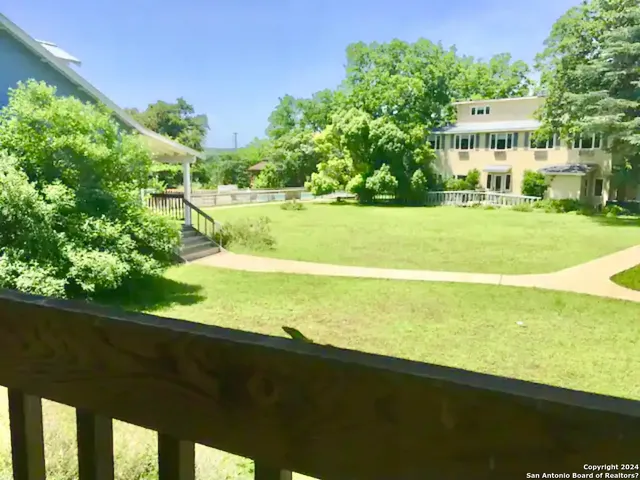 a view of building with yard