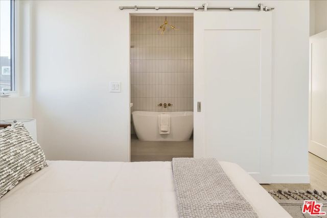 a bathroom with a sink and a shower