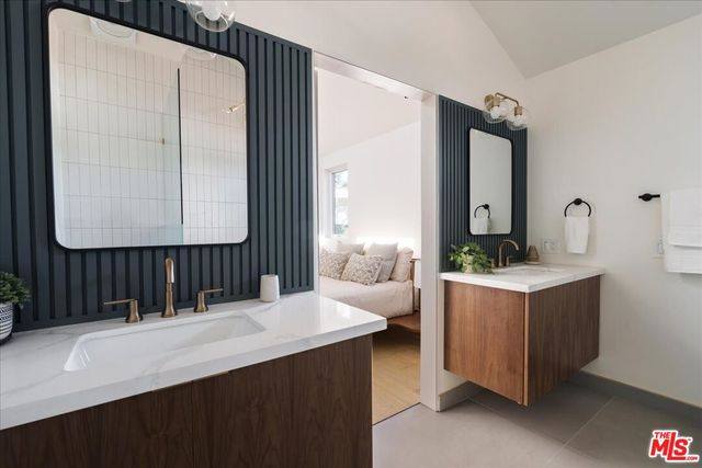 a view of living room with granite countertop furniture and a dresser