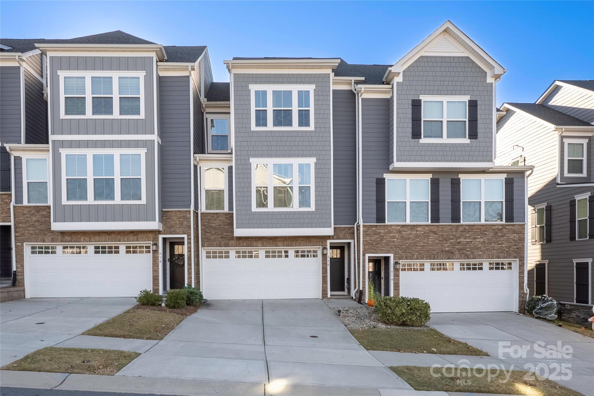 a front view of a building with many windows